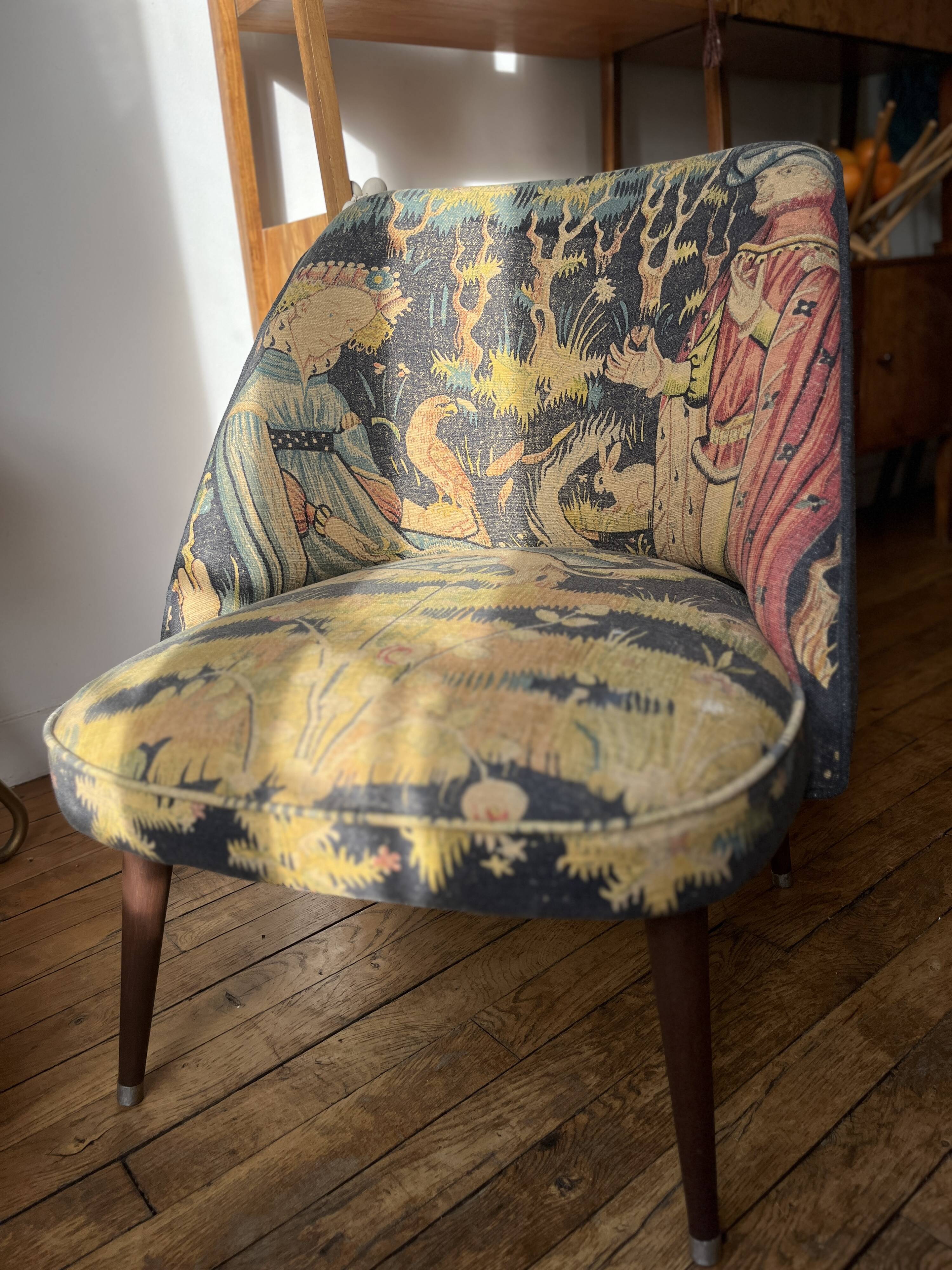 J. Tenreiro, Brazil. Concha armchair with tapered legs, Cluny tapestry 1400.