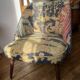 J. Tenreiro, Brazil. Concha armchair with tapered legs, Cluny tapestry 1400.