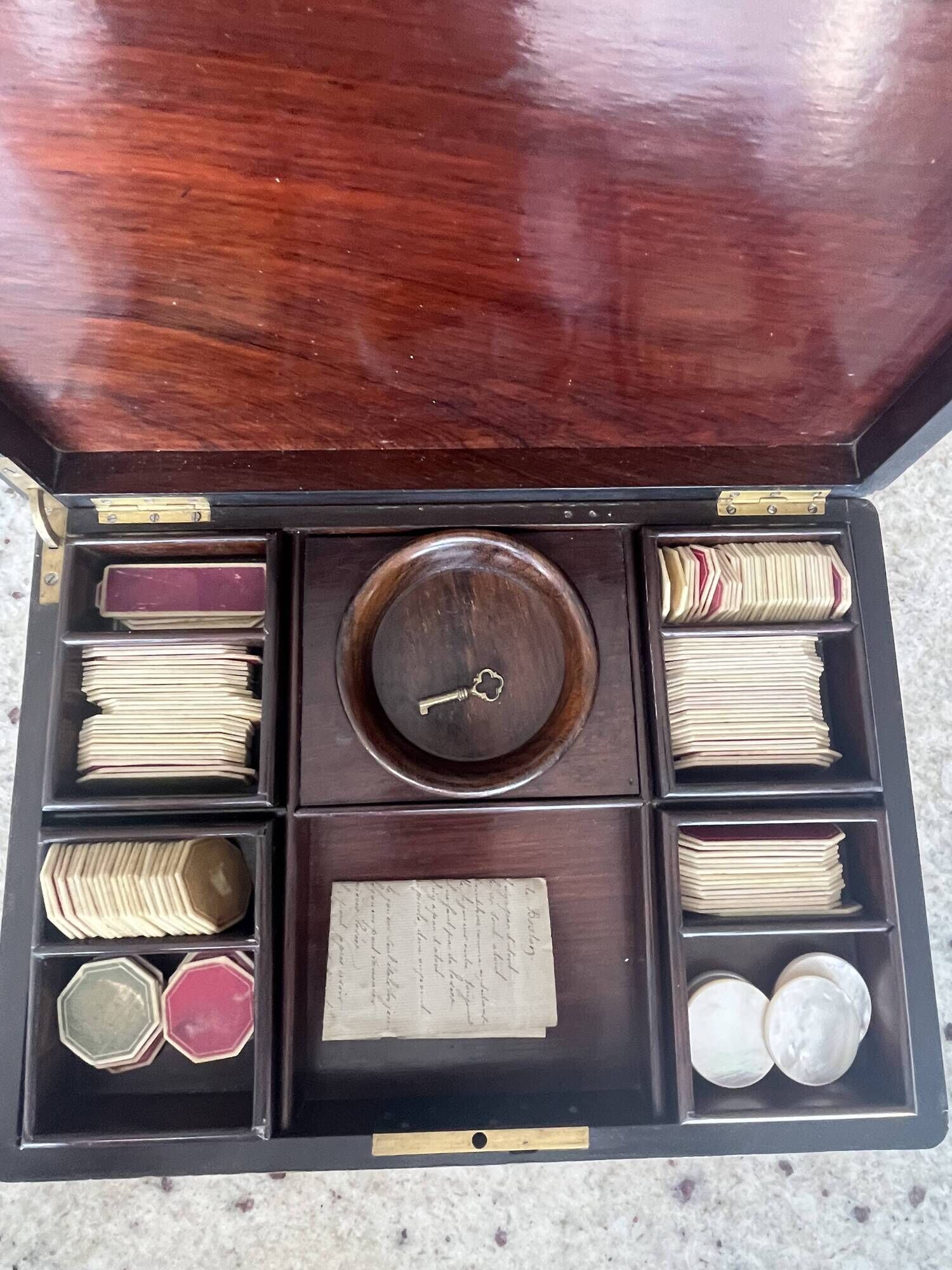 Antique Boston game box from the 19th century - marquetry, tokens, and handwritten rules.
