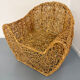 Sculptural woven rattan armchair, organic design from the 1970s.