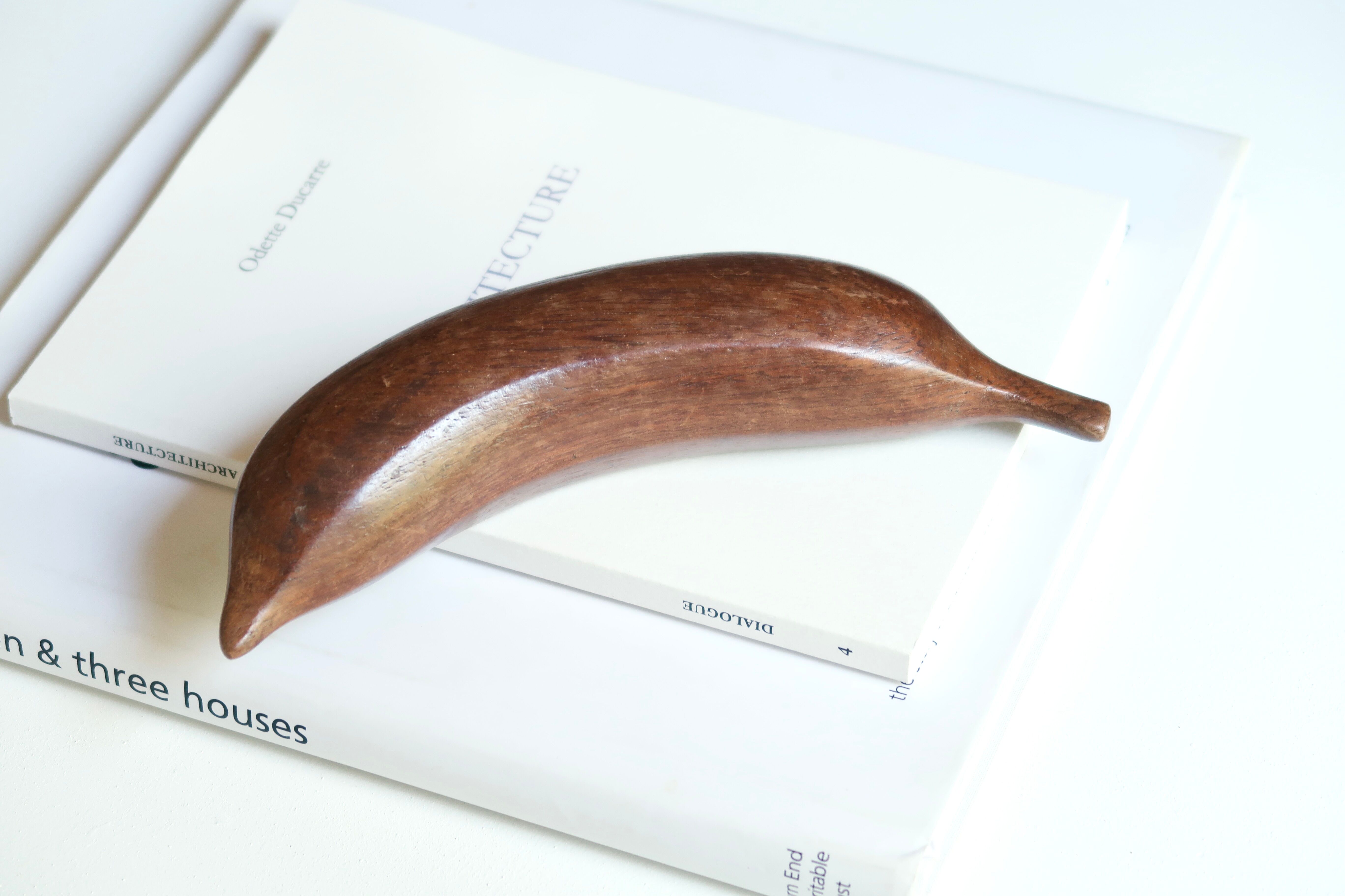 Wooden banana paperweight, 70s