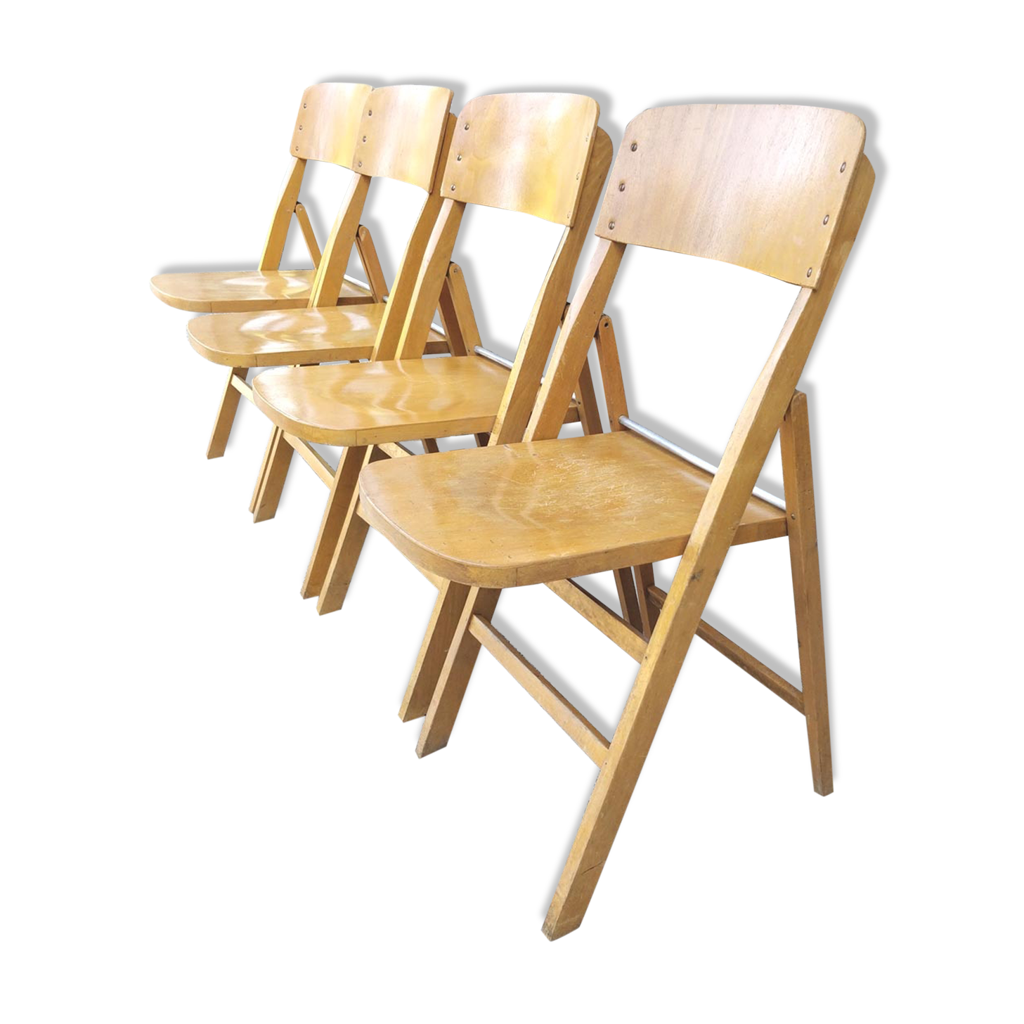 Four 60s wooden Stella chairs