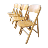 Four 60s wooden Stella chairs