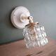 Small chiselled glass wall light