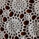 Old crocheted round tablecloth