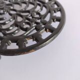 Large vintage black cast iron trivet