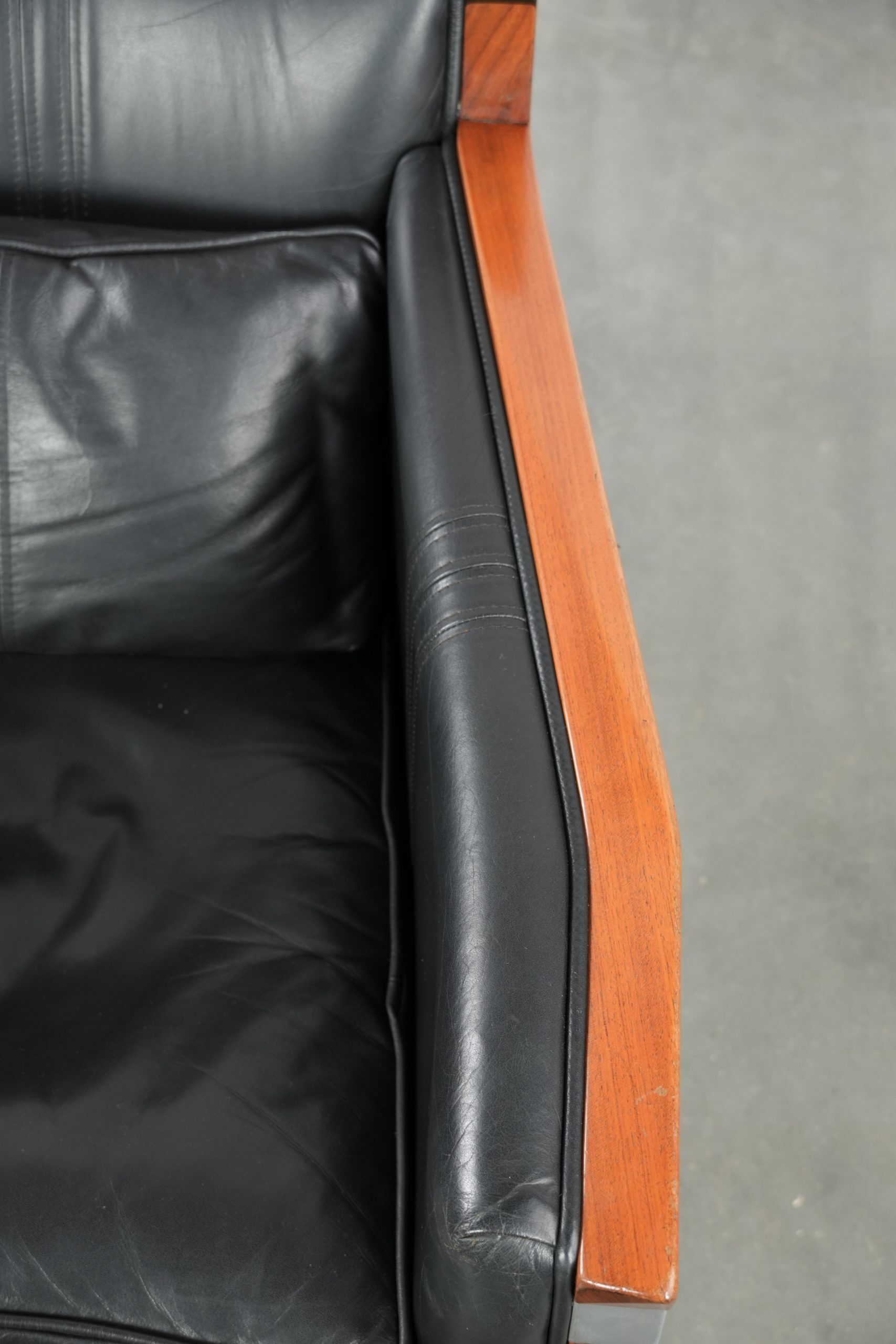 Black leather Art Deco design armchair in good condition