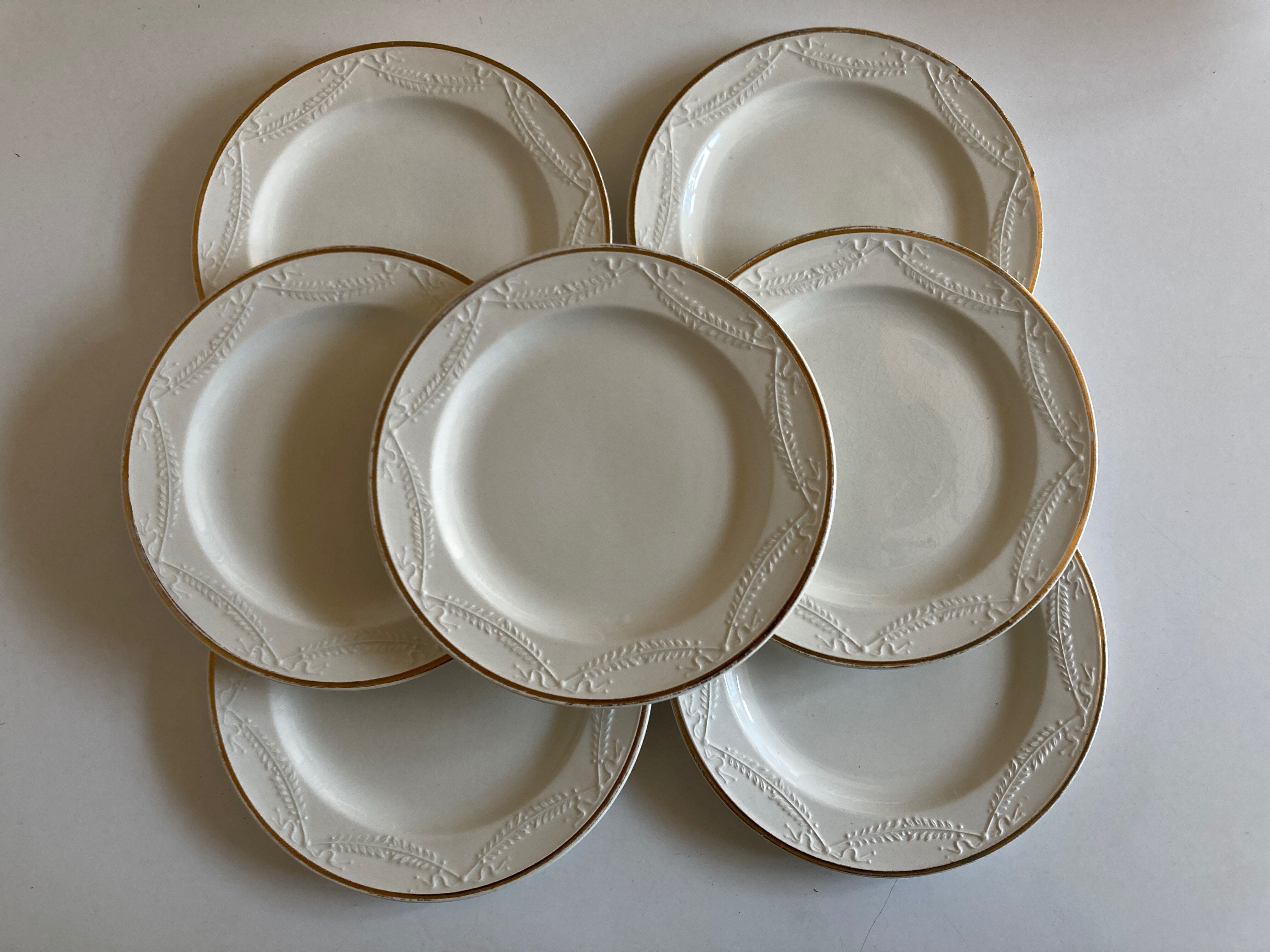 Set of 7 neo-classical plates directoire fine earthenware from Gien 19th
