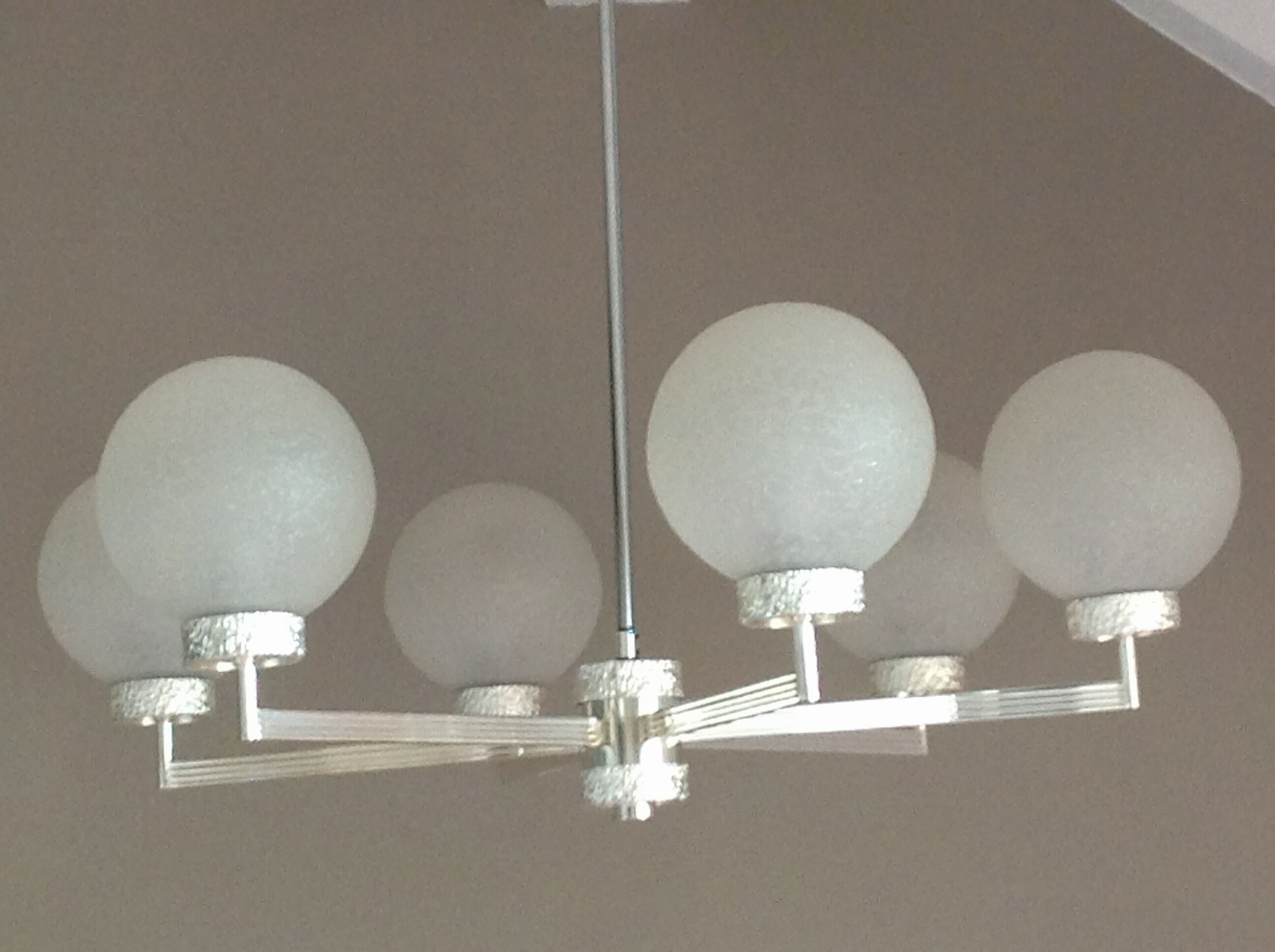 Six-light chrome metal chandelier and opaque glass globes / vintage 60s and 70s