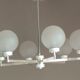 Six-light chrome metal chandelier and opaque glass globes / vintage 60s and 70s
