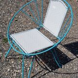 Old vintage turquoise metal armchair