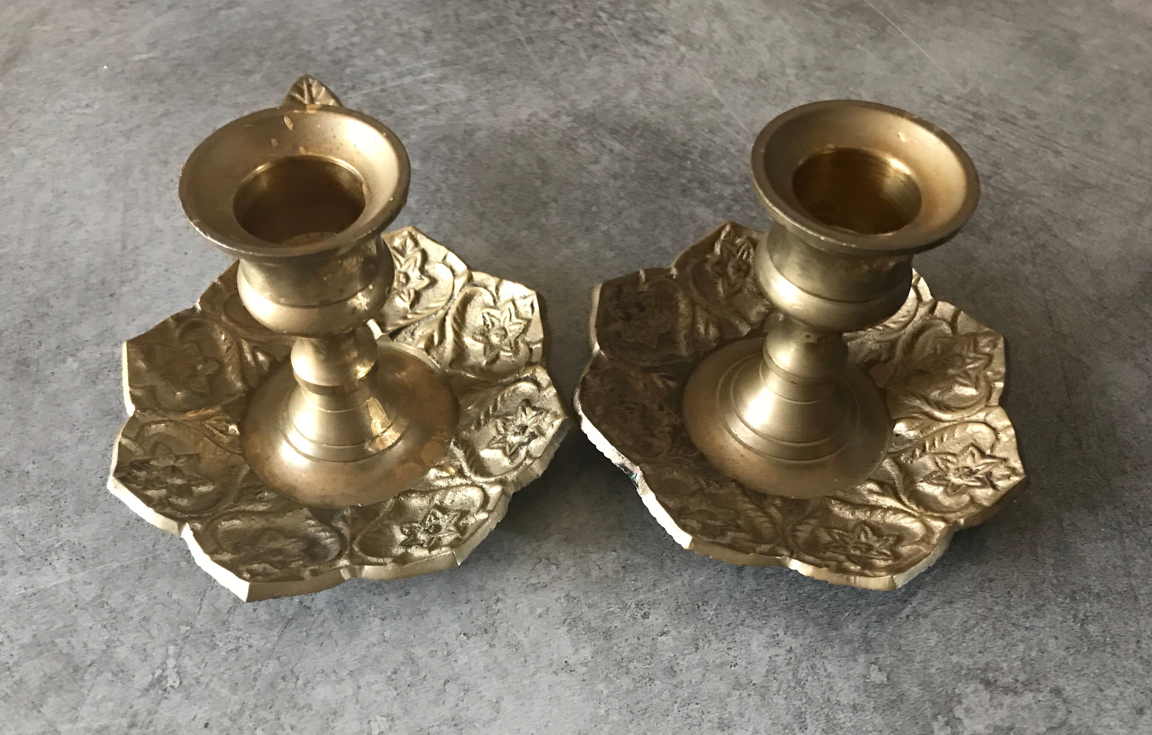 PAIR of BRASS table CANDLE HOLDERS with Flower Patterns