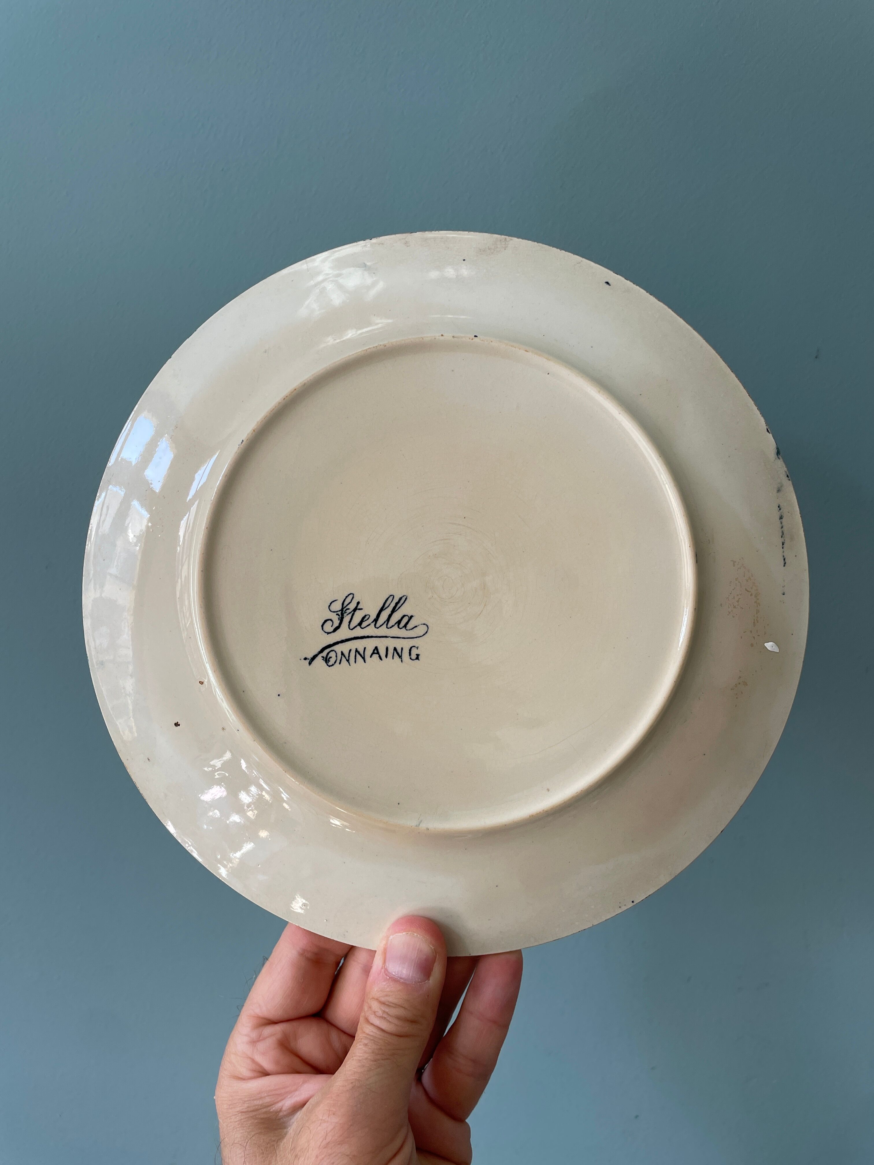 Set of 8 flat plates 19th century Terre de Fer, “Stella” Onnaing earthenware