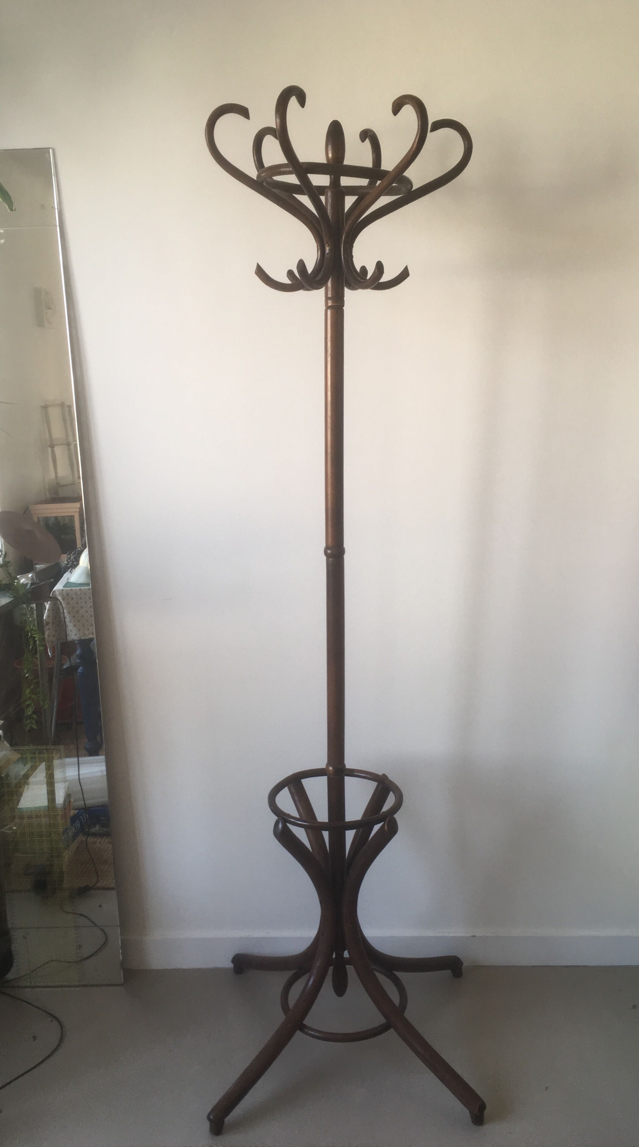 Old curved wooden parrot coat holders