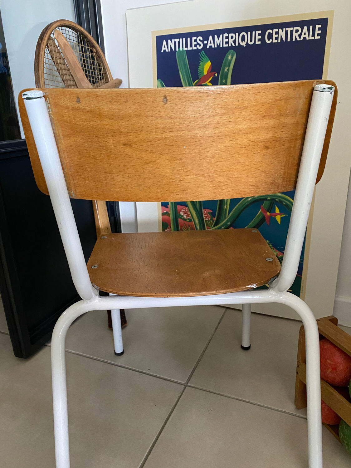 Old wooden and metal children's school chair
