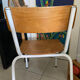 Old wooden and metal children's school chair