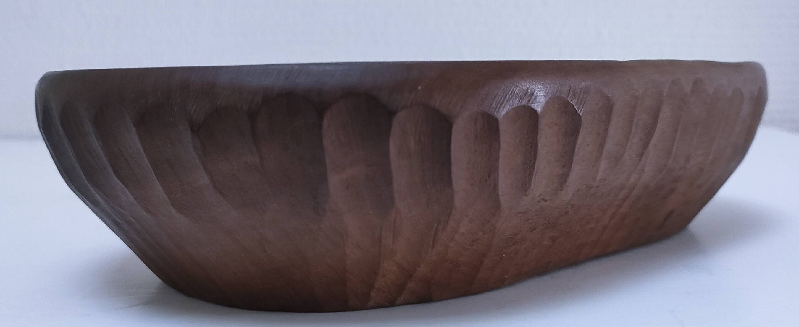 Solid wood pocket emptier, gouged