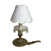 Ancient cave lamp in gilded bronze