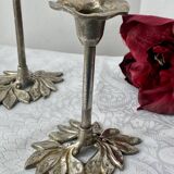 Pair of metal flower candlesticks