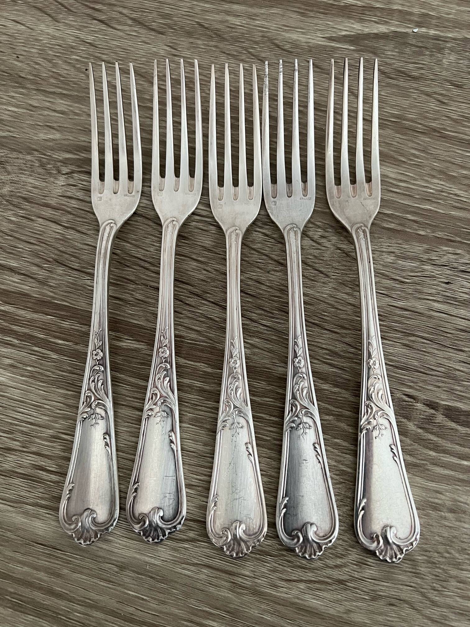 5 silver-plated metal forks with the Ercuis hallmark.