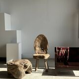 Small low armchair in varnished brown wood