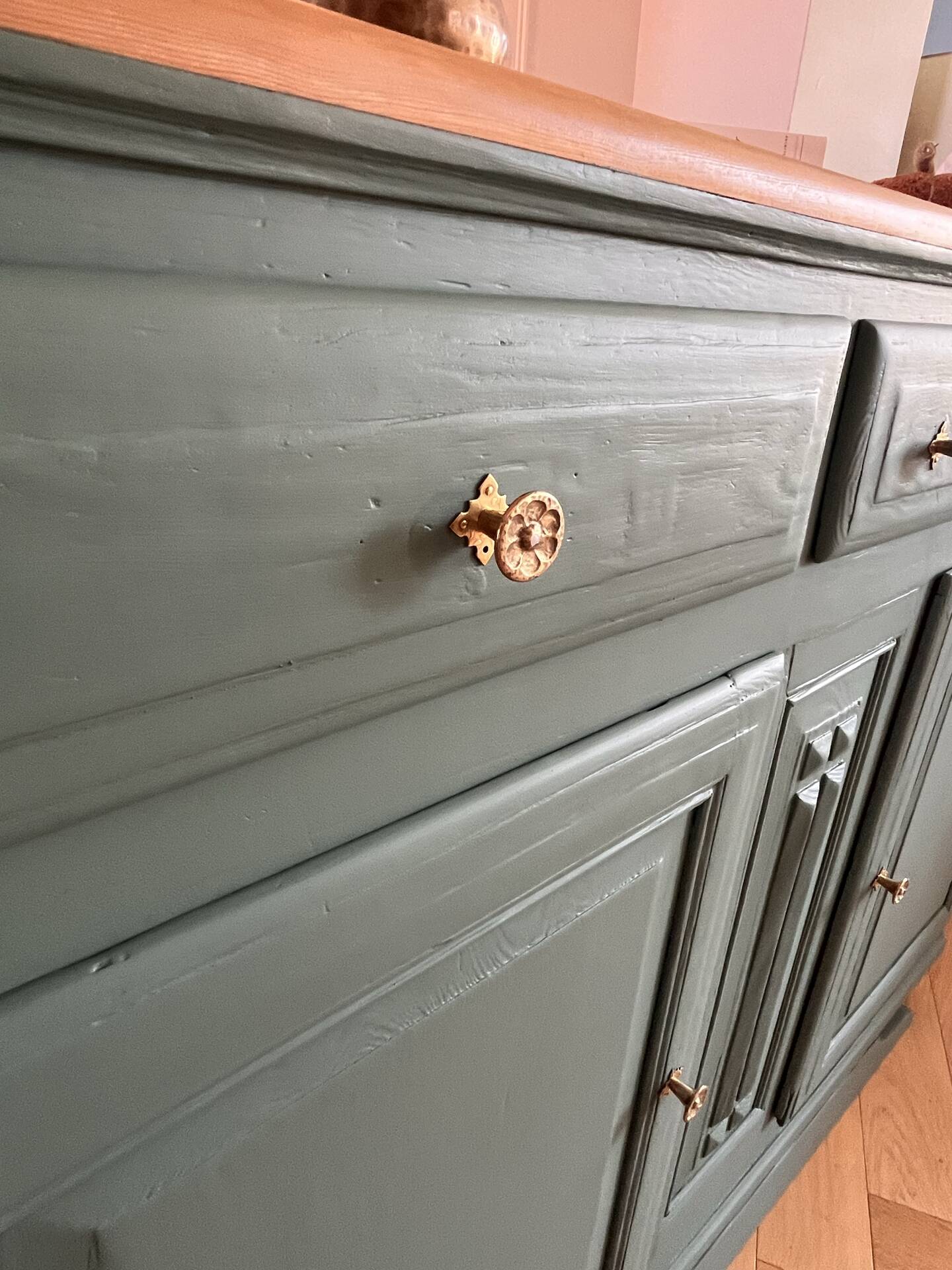 Sage green buffet with moustache legs
