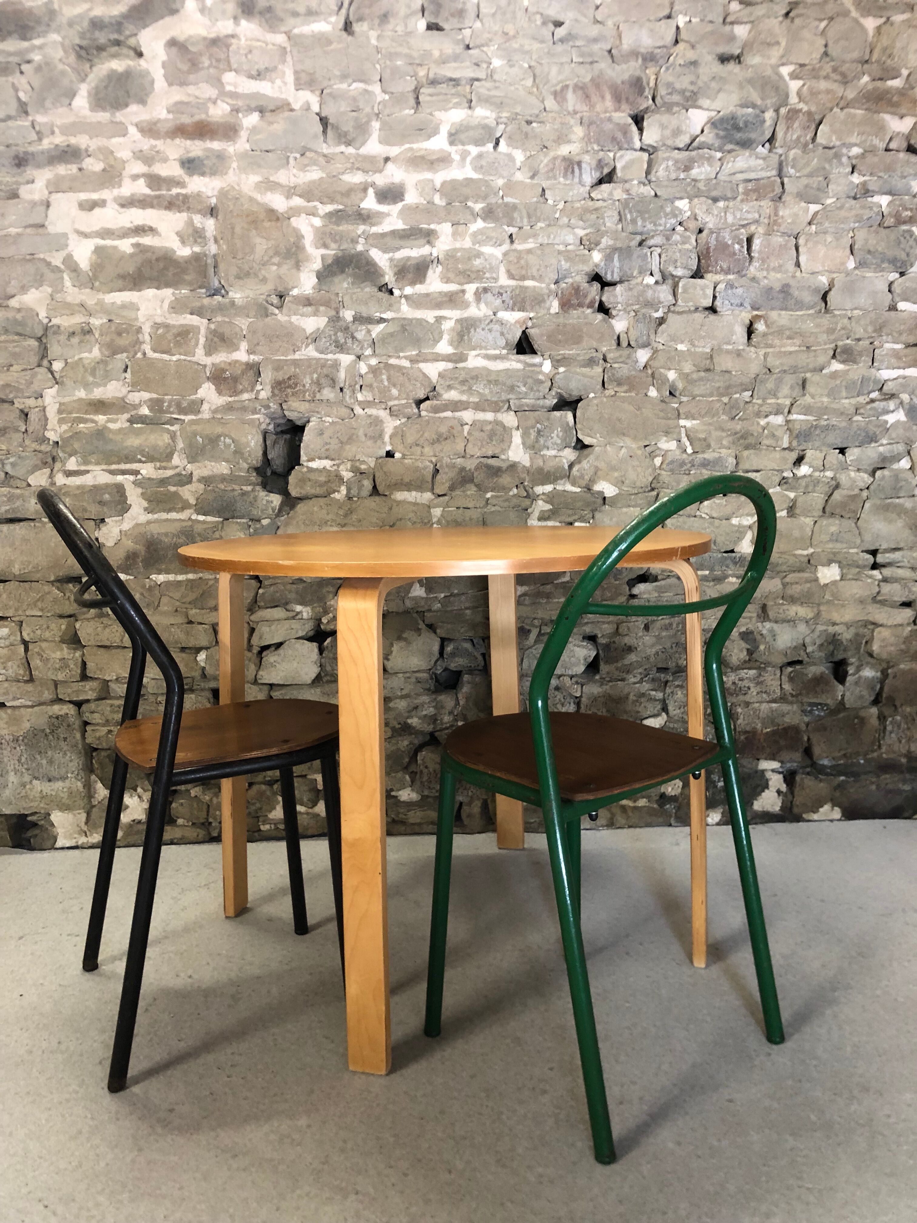 Round dining table in vintage wood
