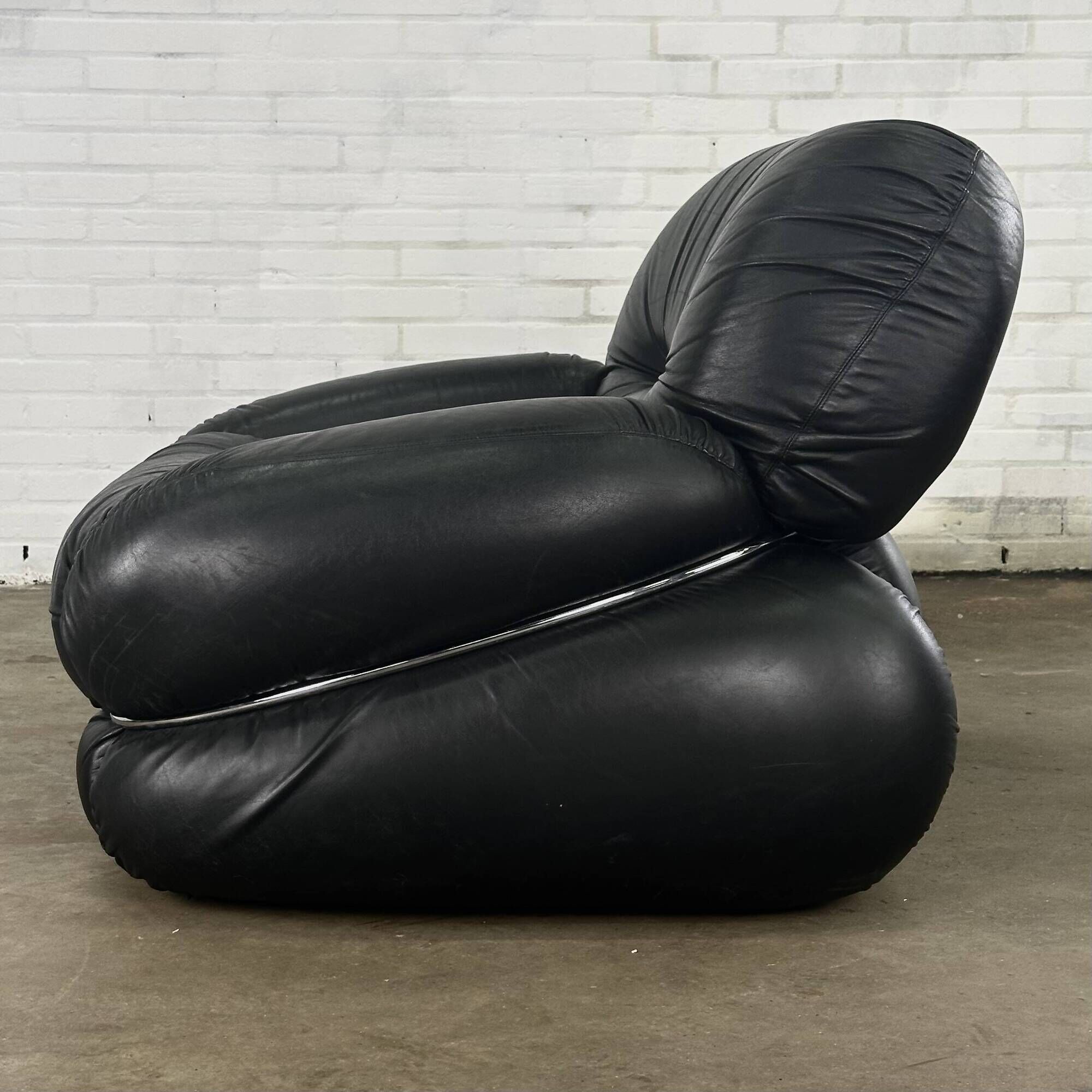 Okay armchair by Adriano Piazzesi in black leather with ottoman