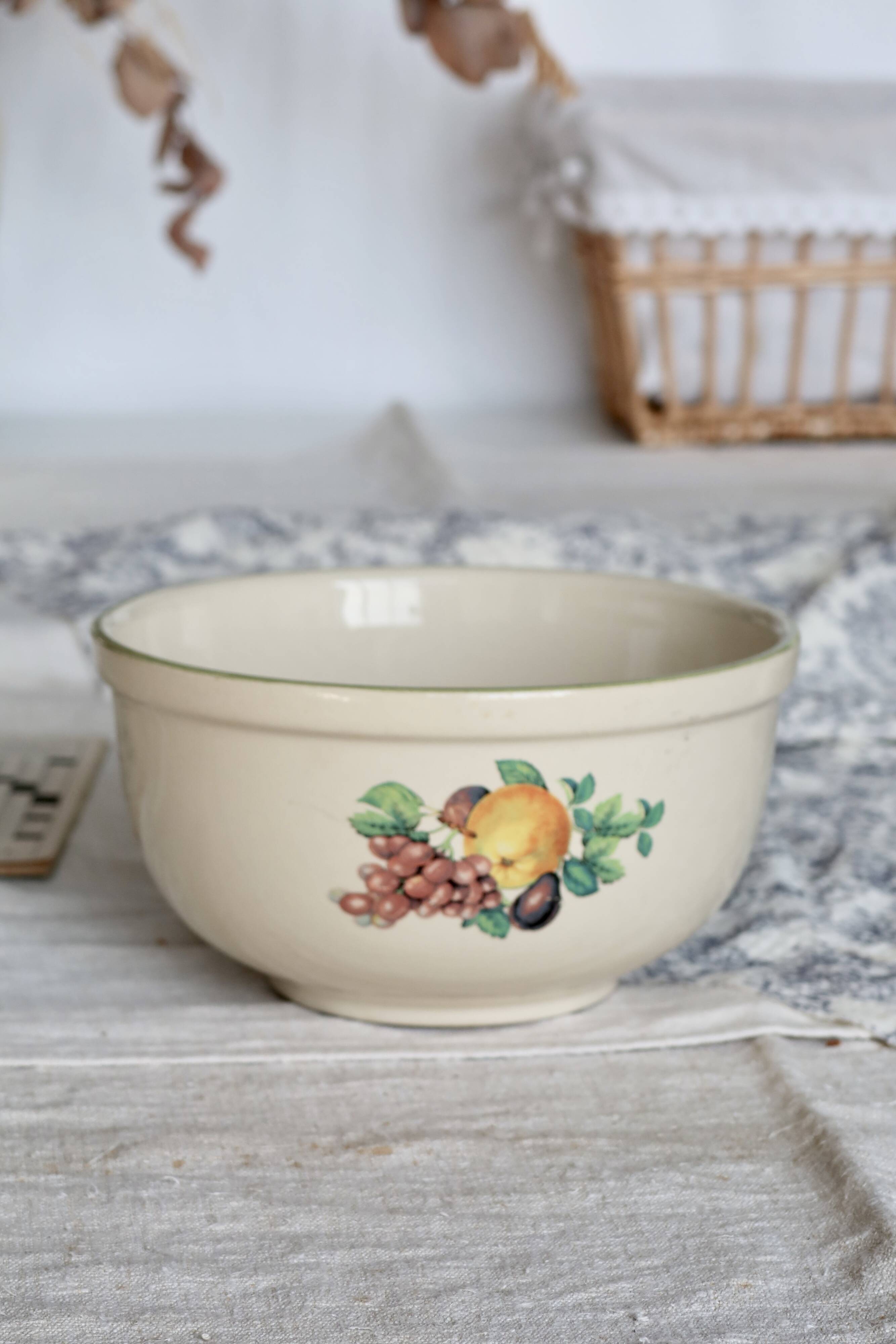 Vintage round earthenware salad bowl with fruit pattern