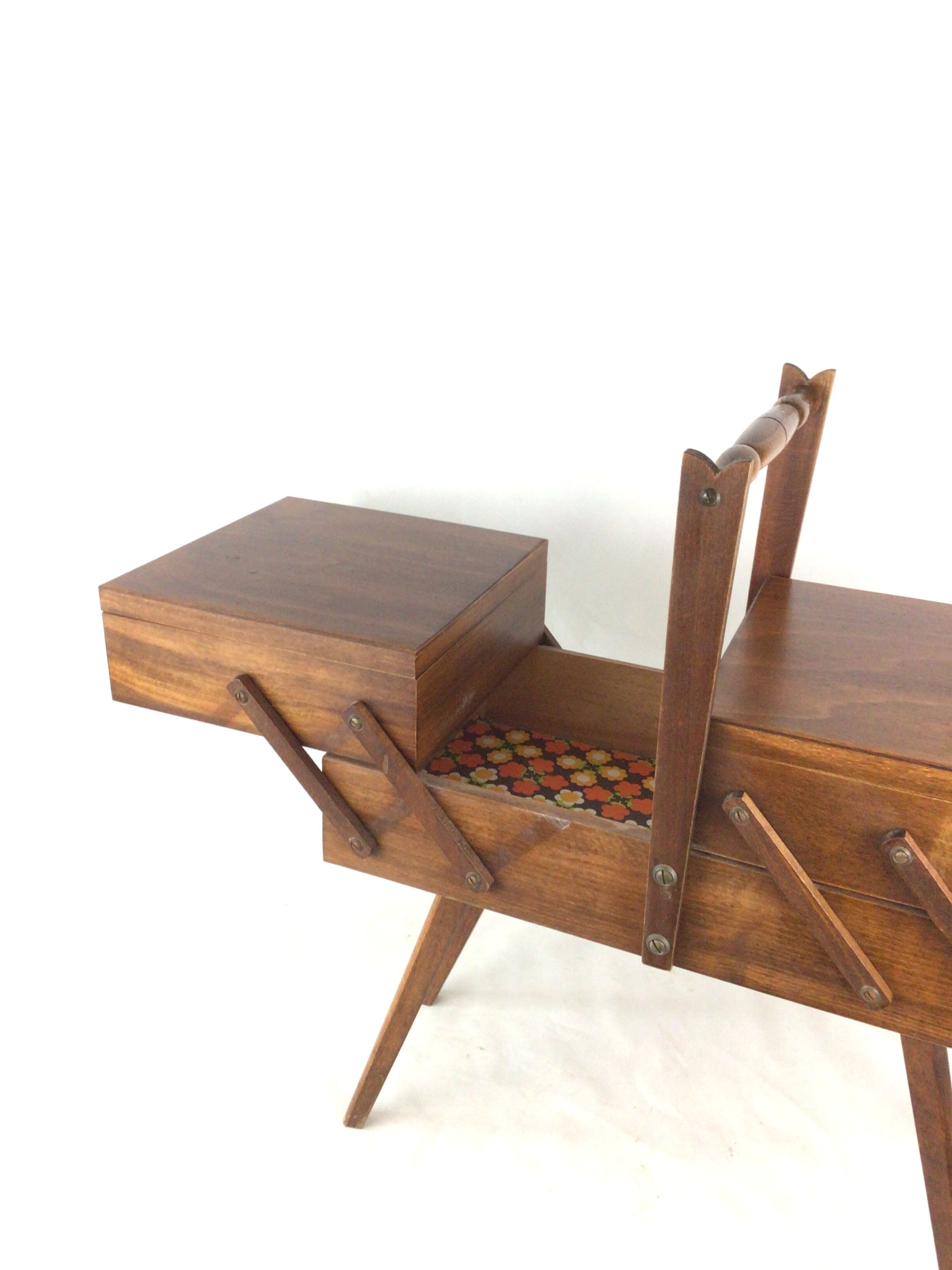 Worker on wooden compass feet