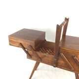 Worker on wooden compass feet