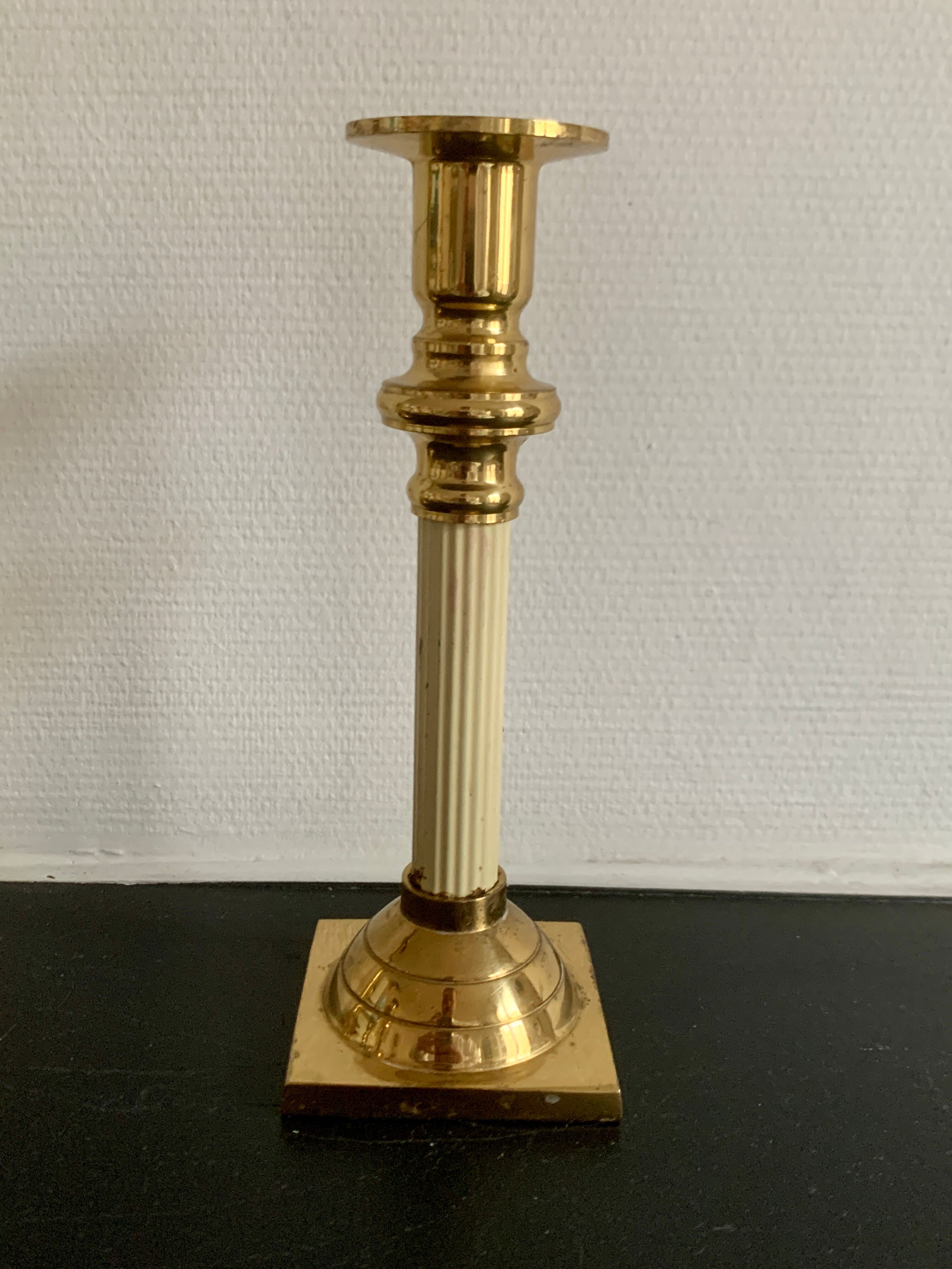 Set of 9 vintage brass candlesticks