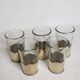 Ensemble de 5 verres à thé marocains anciens en verre et maillechort martelé