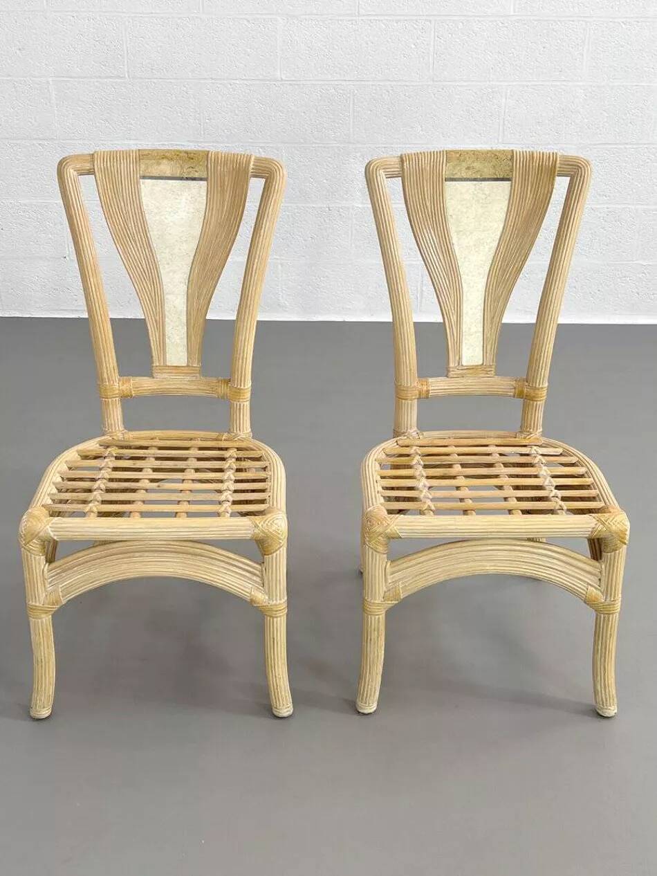 1970s rattan table with stone marquetry and matching chairs.