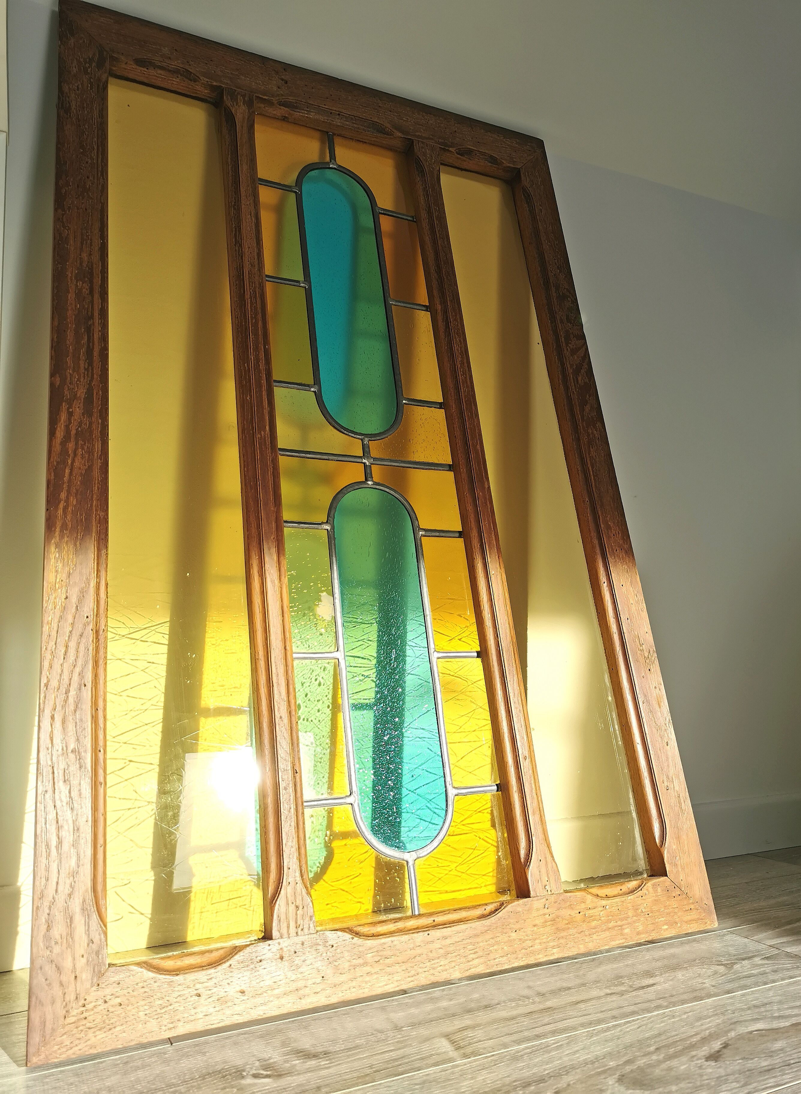 Stained glass window with framing
