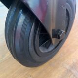 Gae Aulenti coffee table for Fontana Arte, transparent glass top with black cast iron supports, 1980s.