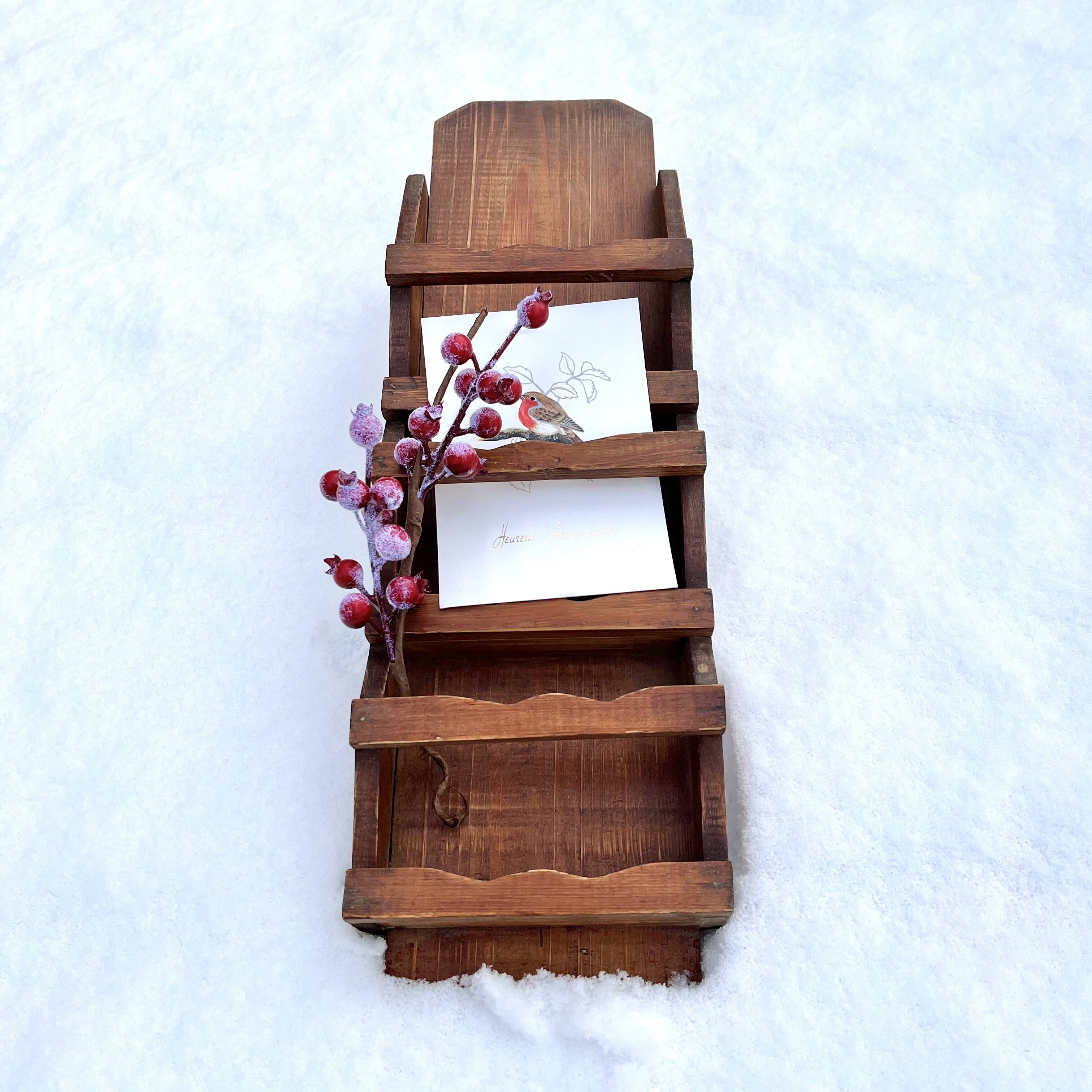 Old wall shelf for postcards or mail