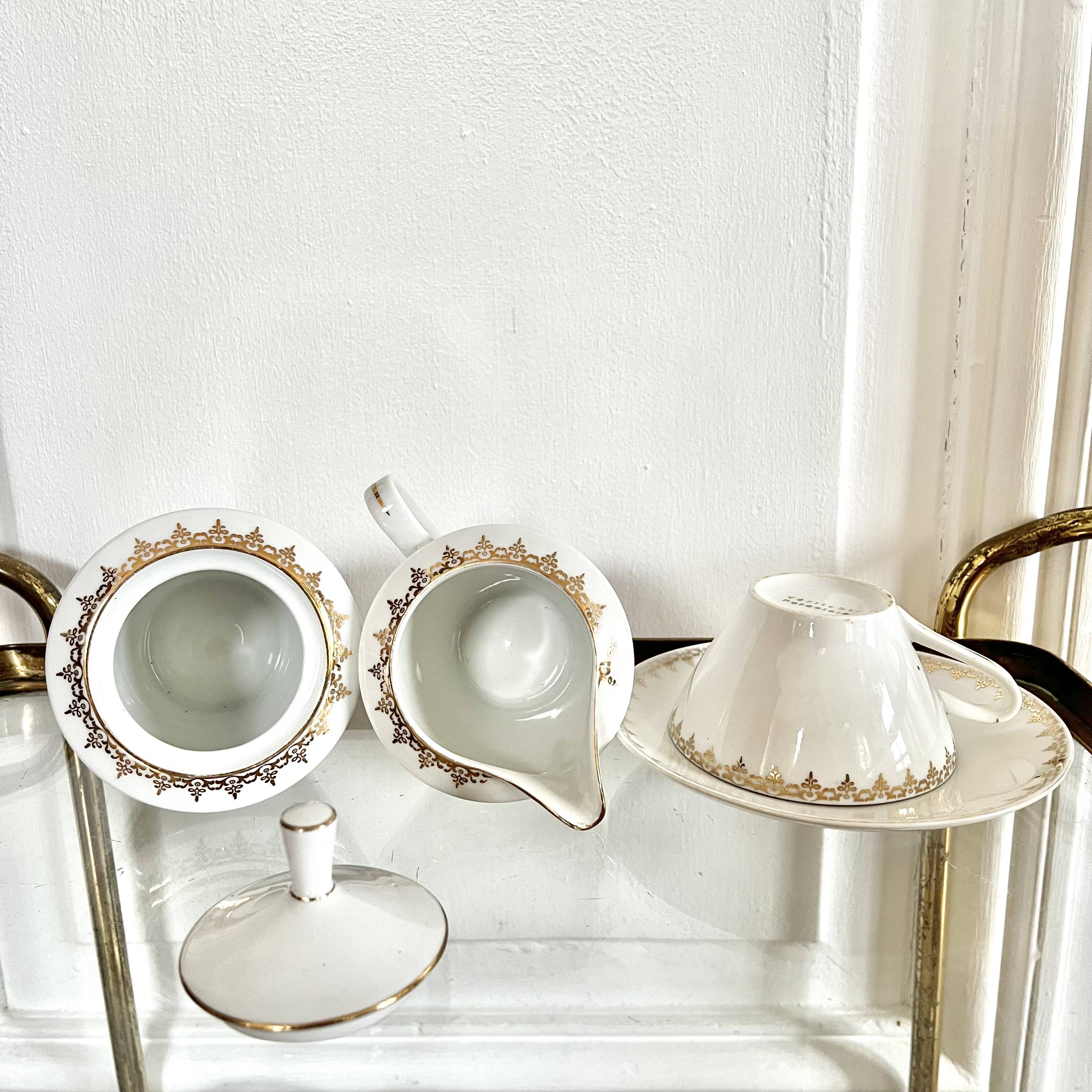 Porcelain sugar bowl and milk jug