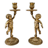 Pair of bronze “Cherubim” candlesticks