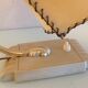 Brass bedside lamp and beige lampshade art deco style