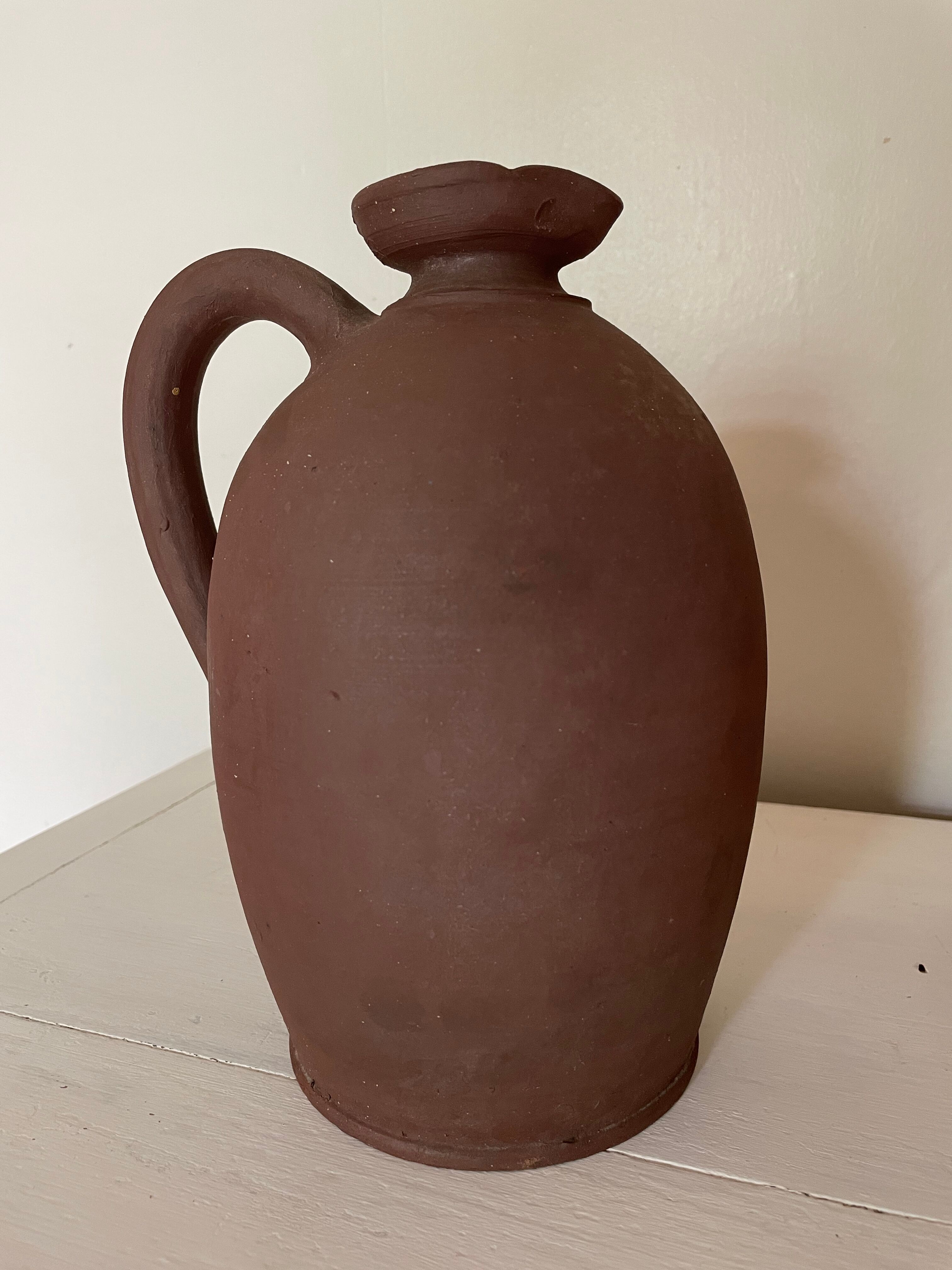 Jar and terracotta bottle