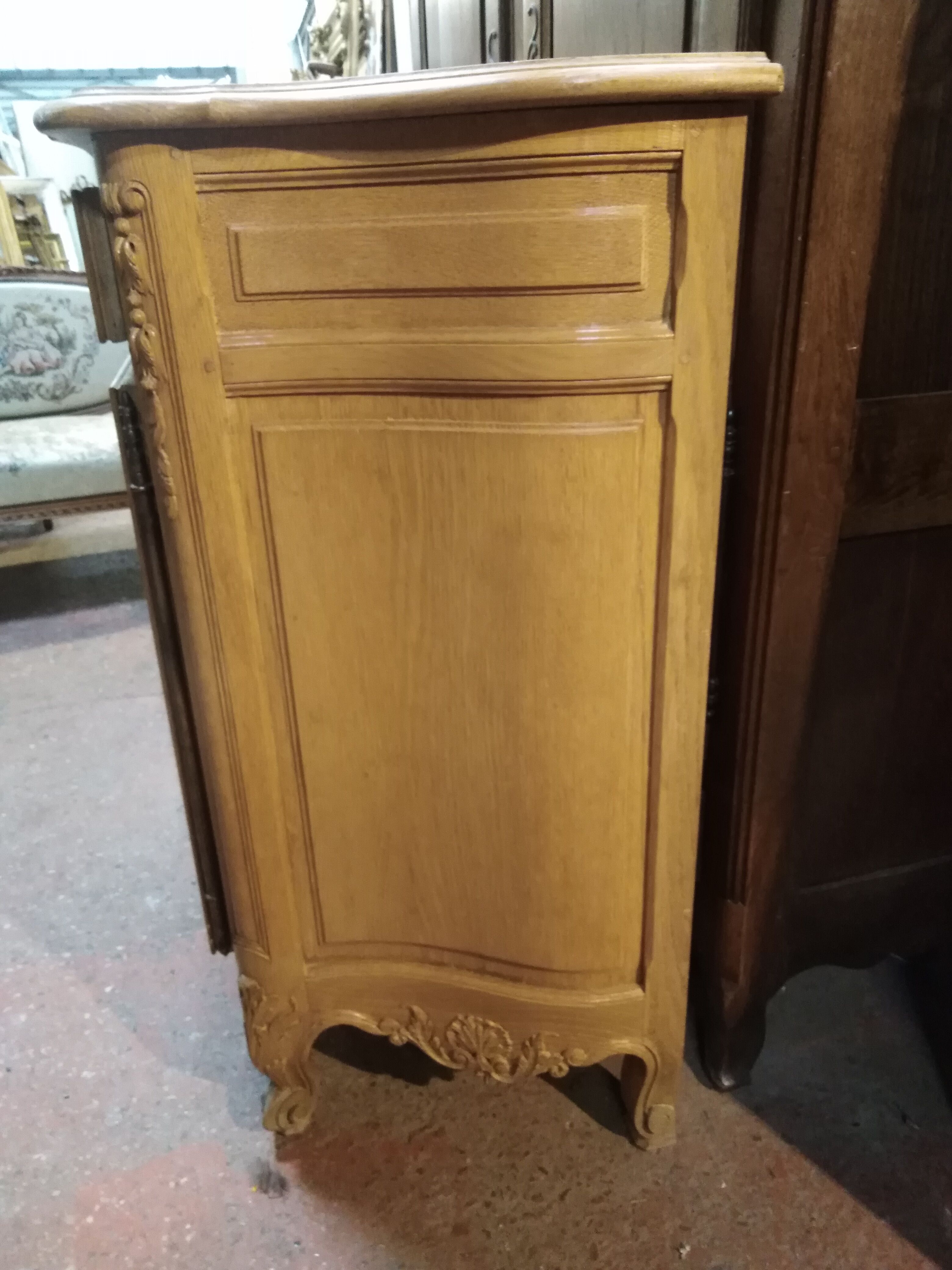 Curved buffet, sculpted Provençal style