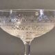 8 antique Baccarat crystal champagne coupes with engraved decoration.