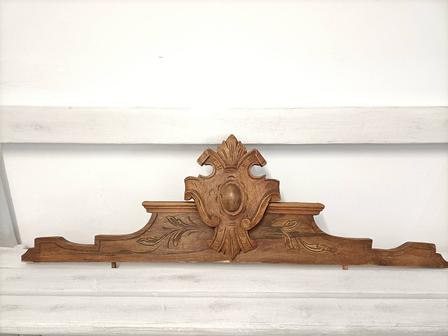 Antique carved wooden door pediment