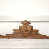 Antique carved wooden door pediment