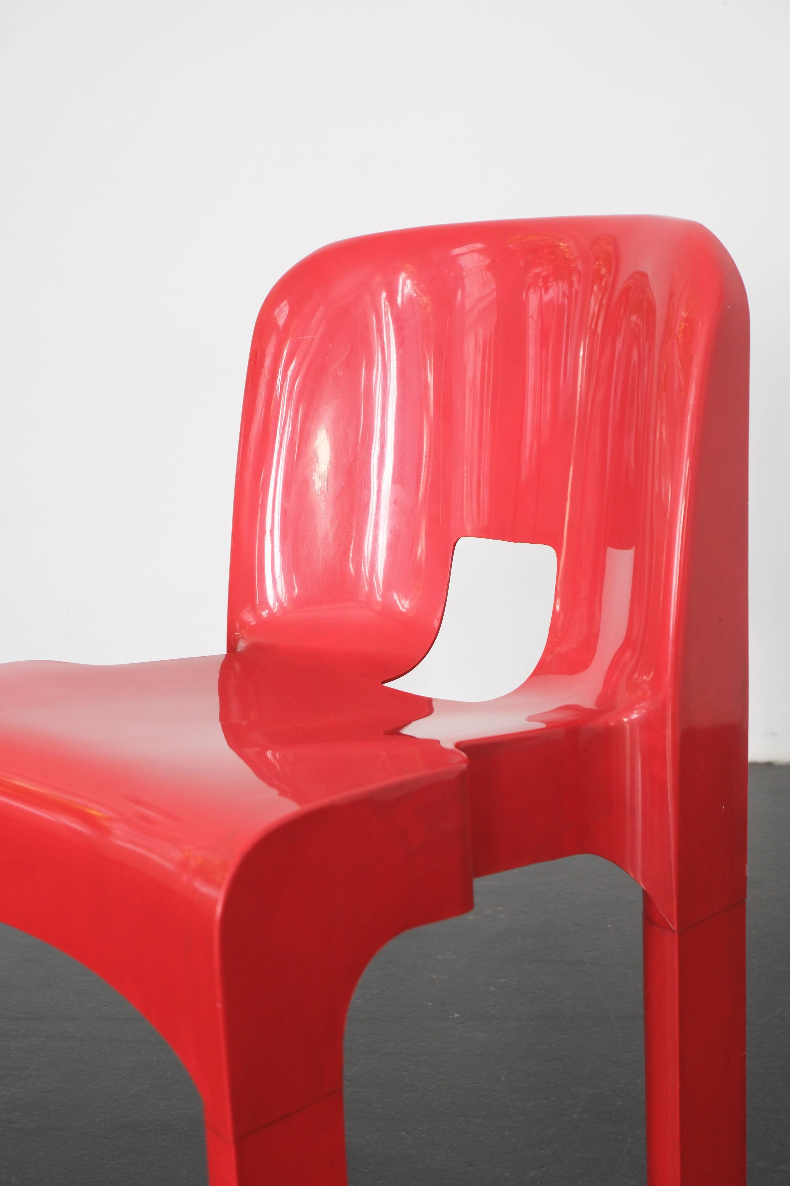 Red "Universale" chair by Joe Colombo / Kartell