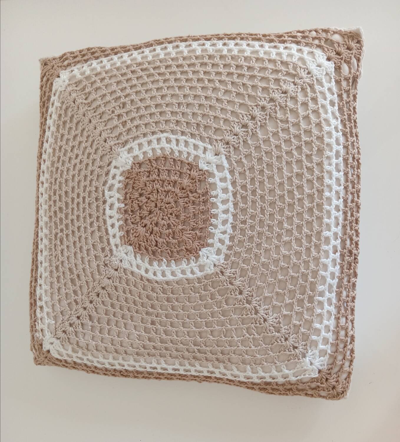 Pair of crocheted cushions