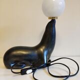 Lampe otarie noire irisée bleue en terre cuite