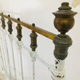 Old white metal and brass bed