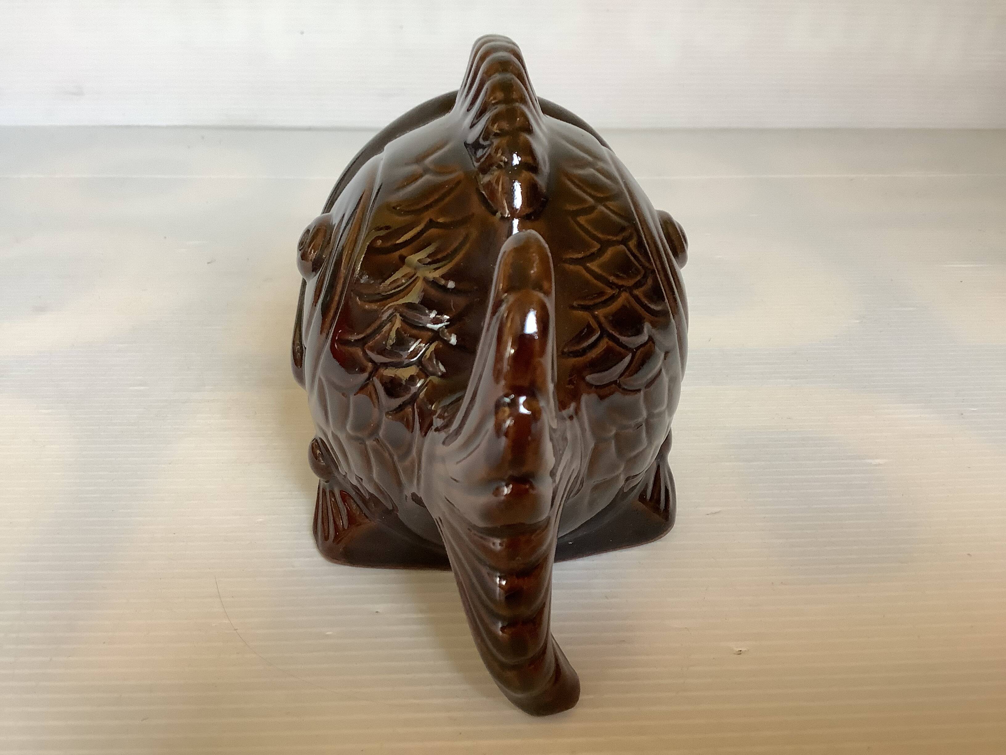 Brown ceramic fish ashtray